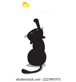 black cat trying to catch butterfly