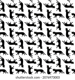 Black cats pattern isolated on white background. Vector seamless background for textile, wallpapers, print, gift wrap and scrapbooking.