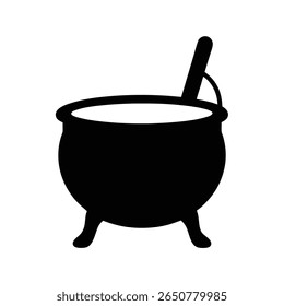 Black cauldron with white liquid and a spoon on a white background