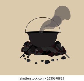 Black cauldron for witches with coal