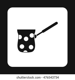 Black cezve with white dots icon in simple style on a white background