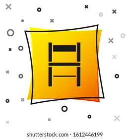 Black Chair icon isolated on white background. Yellow square button. Vector Illustration
