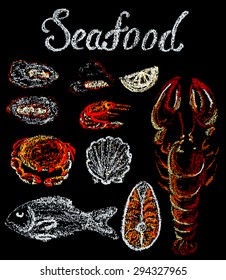 Black chalkboard with hand drawn different seafood