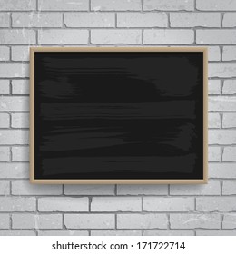 Black chalkboard with wooden frame on brick wall background. Vector eps-10.