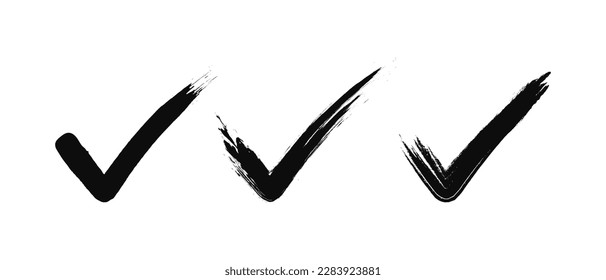 Black check marks on a white background. Set of grunge inc brush-drawn icons. Vector