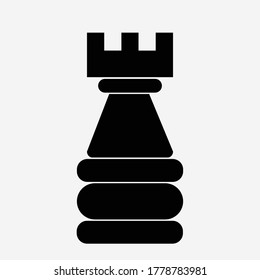 A black chess castle with a white background