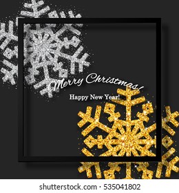 Black Christmas background with shining gold and silver snowflakes. 