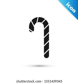 Black Christmas candy cane with stripes icon isolated on white background. Merry Christmas and Happy New Year.  Vector Illustration