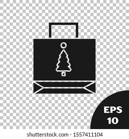 Black Christmas paper shopping bag icon isolated on transparent background. Package sign. Merry Christmas and Happy New Year.  Vector Illustration