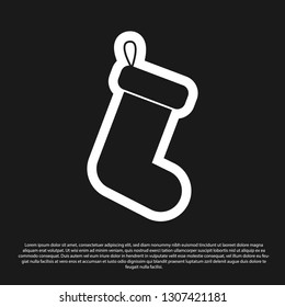 Black Christmas sock icon isolated on black background. Vector Illustration