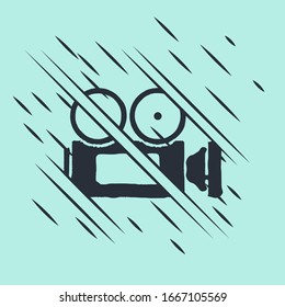 Black Cinema camera icon isolated on green background. Video camera. Movie sign. Film projector. Glitch style. Vector Illustration