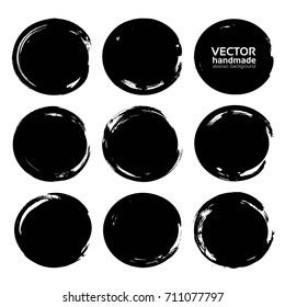 Black circles brush strokes isolated on a white background