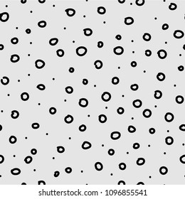 Black circles on gray background, vector seamless pattern