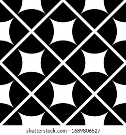 Black circles on white background. Seamless textile design.