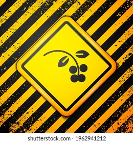 Black Coffee bean, branch with leaf and berry icon isolated on yellow background. Plant with leaf, berry, fruit, seed. Warning sign. Vector Illustration