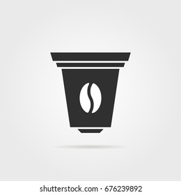 black coffee capsule icon with shadow. concept of kitchen item for percolator or electric coffee maker. simple flat style trend modern logo graphic art design isolated on gray background