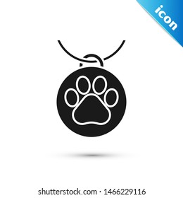 Black Collar with name tag icon isolated on white background. Supplies for domestic animal. Dog or cat paw print. Cat and dog care. Pet chains.  Vector Illustration