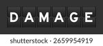 Black color analog flip board with word damage on gray background