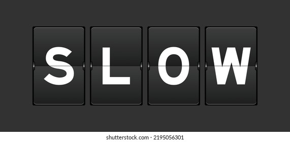 Black color analog flip board with word slow on gray background