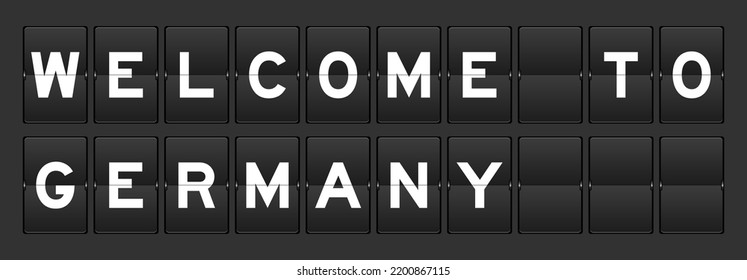 Black color analog flip board with word welcome to germany on gray background