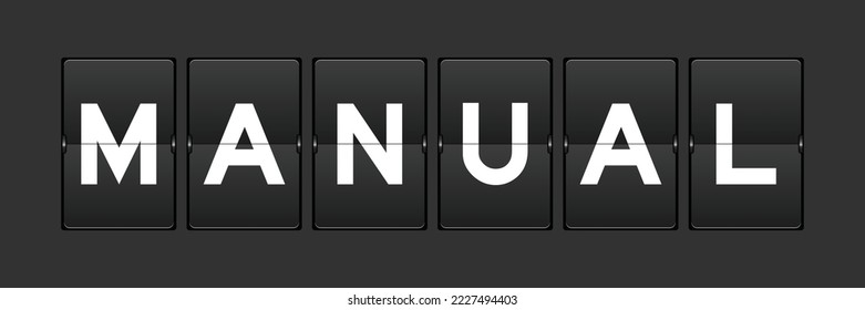 Black color analog flip board with word manual on gray background