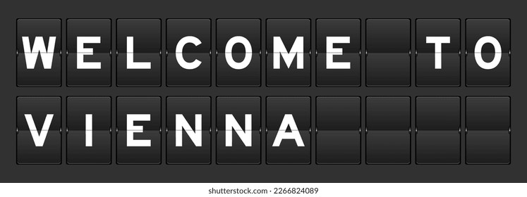 Black color analog flip board with word welcome to vienna on gray background