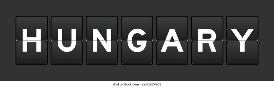 Black color analog flip board with word hungary on gray background