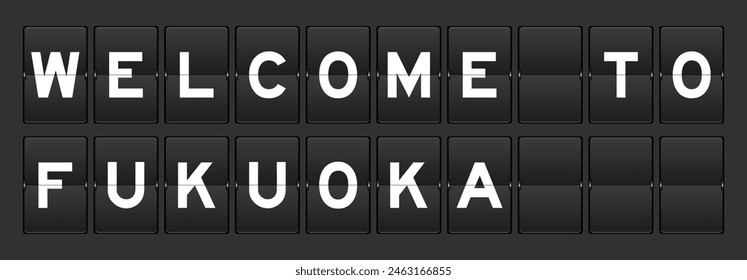 Black color analog flip board with word welcome to fukuoka on gray background