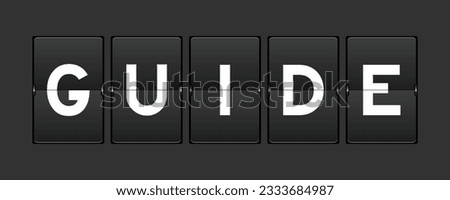 Black color analog flip board with word guide on gray background