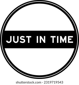 Black color round seal sticker in word just in time on white background