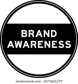 Black color round seal sticker in word brand awareness on white background
