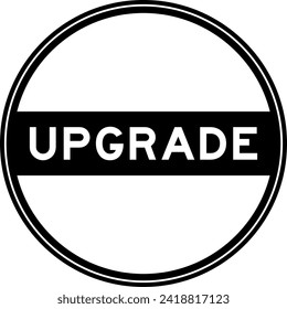 Black color round seal sticker in word upgrade on white background
