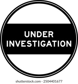 Black color round seal sticker in word under investigation on white background