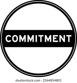 Black color round seal sticker in word commitment on white background