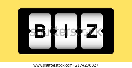 Black color in word BIZ (abbreviation of business) on slot banner with yellow color background