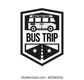 The black colored bus trip vector emblem with the lettering vector illustration.
