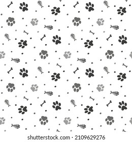 Black coloured Paw, fish, bone pattern. Funny animal design. Vector illustration.