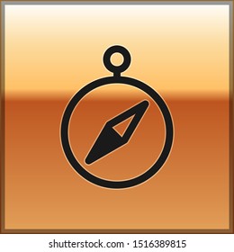 Black Compass icon isolated on gold background. Windrose navigation symbol. Wind rose sign.  Vector Illustration
