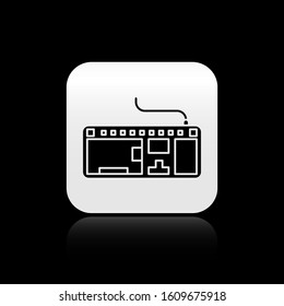 Black Computer keyboard icon isolated on black background. PC component sign. Silver square button. Vector Illustration
