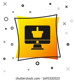 Black Computer monitor with shopping basket icon isolated on white background. Online Shopping cart. Supermarket basket symbol. Yellow square button. Vector Illustration