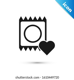 Black Condom in package icon isolated on white background. Safe love symbol. Contraceptive method for male.  Vector Illustration