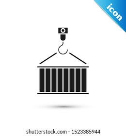 Black Container on crane icon isolated on white background. Crane lifts a container with cargo.  Vector Illustration