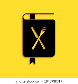 Black Cookbook icon isolated on yellow background. Cooking book icon. Recipe book. Fork and knife icons. Cutlery symbol. Restaurant symbol. Long shadow style. Vector.