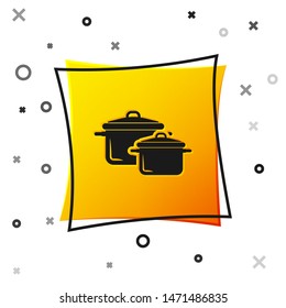Black Cooking pot icon isolated on white background. Boil or stew food symbol. Yellow square button. Vector Illustration