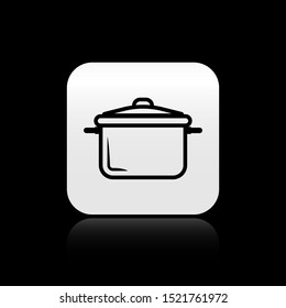 Black Cooking pot icon isolated on black background. Boil or stew food symbol. Silver square button. Vector Illustration