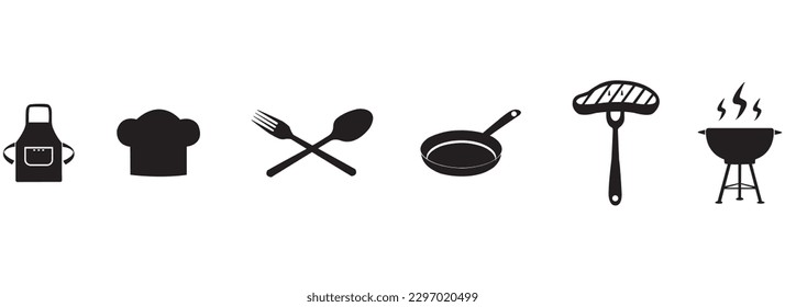 Black cooking utensils and equipment on a white background with copy space 