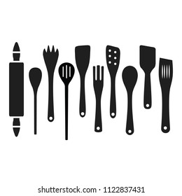 Black Cooking wooden kitchen tools spoons spatulas on the white background up down