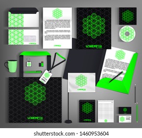 Black corporate identity with a bright green element. Vector template business design set of stationery