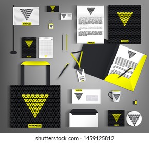 Black corporate identity with a yellow triangle. Vector template business design set of stationery.