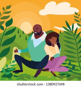 black couple seated in the field
